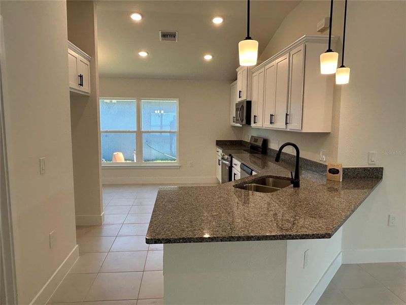Furnished interior view inside a new home in Watercress Cove, North Port (Image 7).