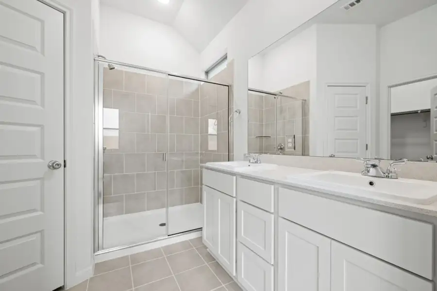 Primary Bath in the Birch home plan by Trophy Signature Homes – REPRESENTATIVE PHOTO