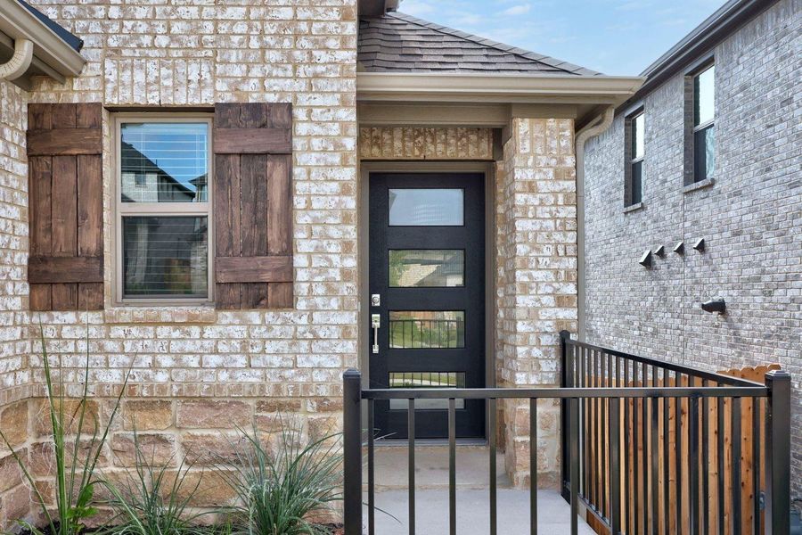 Exterior details and patio area of a home in Lakeside at Tessera, Lago Vista (Image 19). Exterior details and patio area of a home in Lakeside at Tessera, Lago Vista (Image 19).