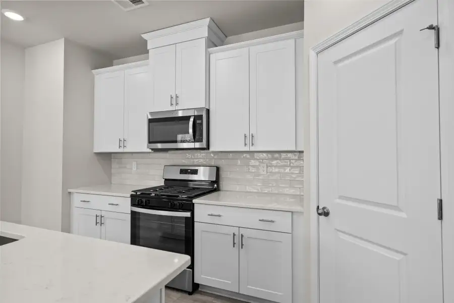 Furnished interior view inside a new home in Waterside - Boardwalk Series, Longs (Image 8). Furnished interior view inside a new home in Waterside - Boardwalk Series, Longs (Image 8).