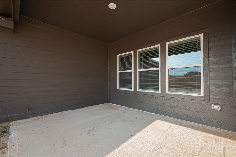 Exterior details and patio area of a home in Sunterra, Katy (Image 20). Exterior details and patio area of a home in Sunterra, Katy (Image 20).