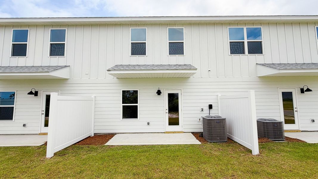 Exterior details and patio area of a home in Salt Creek Townhomes at Mexico Beach, Mexico Beach (Image 3). Exterior details and patio area of a home in Salt Creek Townhomes at Mexico Beach, Mexico Beach (Image 3).