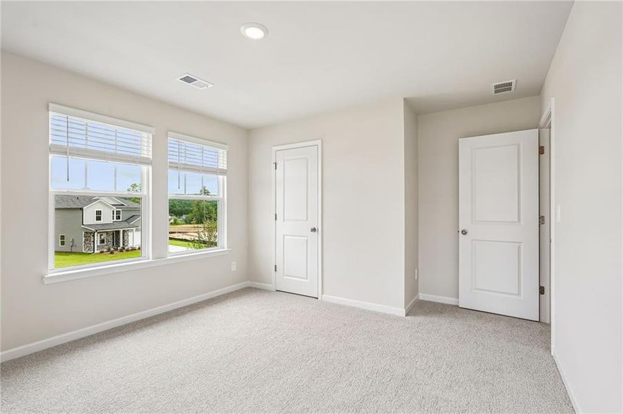 Spacious, unfurnished interior of a new home in Northwoods at Mirror Lake, Villa Rica (Image 48).