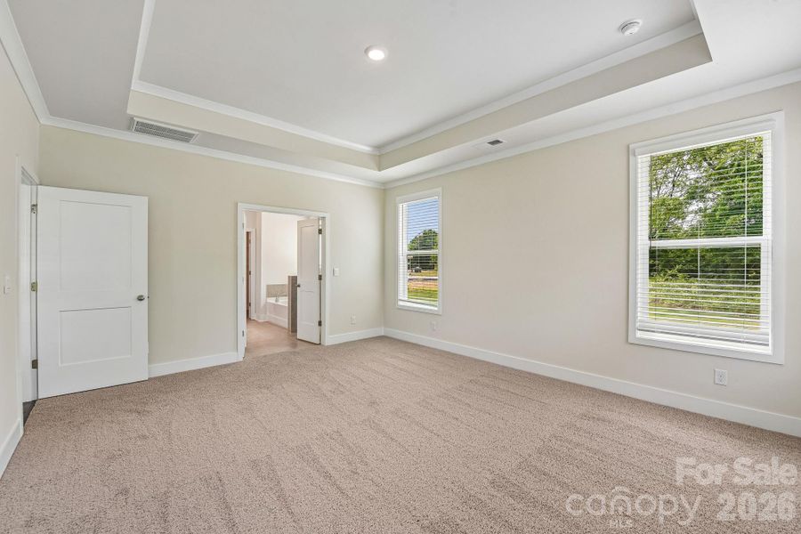 Spacious, unfurnished interior of a new home in Sanctuary at Southgate, Indian Trail (Image 32).