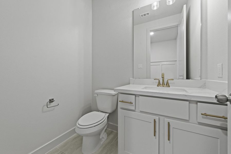 Furnished interior view inside a new home in Bridgeland, Cypress (Image 9).