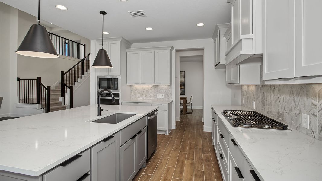 Furnished interior view inside a new home in Lakes of Cane Island, Katy (Image 9).
