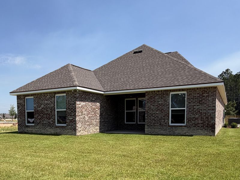 Exterior details and patio area of a home in Natureview, Freeport (Image 4).