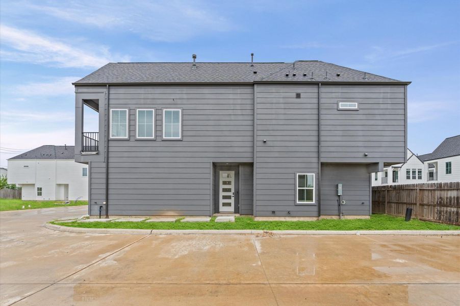 This thoughtfully designed two-story residence offers the perfect blend of modern living and practical layout. The second floor features an open-concept living, dining, and kitchen area, creating a seamless flow ideal for entertaining. Expansive windows and direct access to a private balcony from the living room invite natural light and fresh air, enhancing the indoor-outdoor experience.