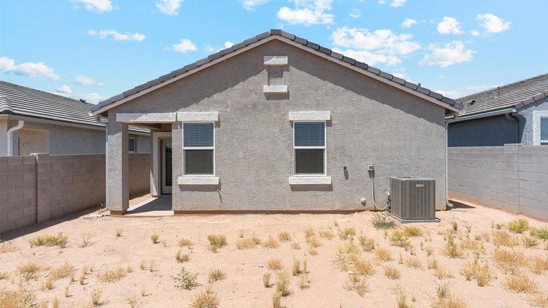 Exterior details and patio area of a home in Radiance at Superstition Vistas, Apache Junction (Image 20).