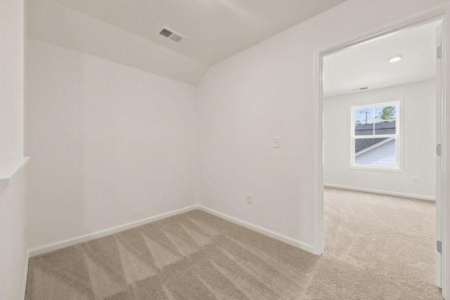 Spacious, unfurnished interior of a new home in Westwood Reserve, Conway (Image 26).