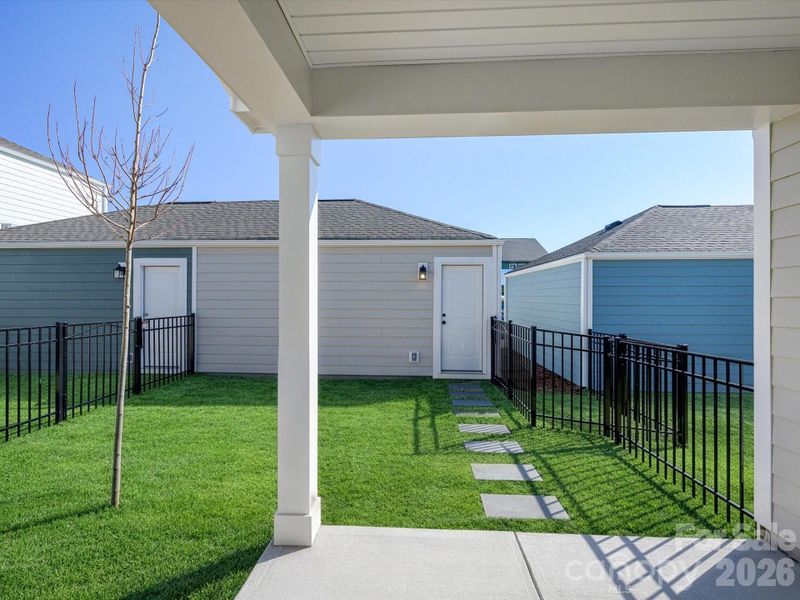 Exterior details and patio area of a home in North Creek Village, Huntersville (Image 23).