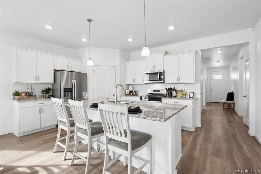 Gourmet kitchen with matching granite surfacces. Gourmet kitchen with matching granite surfacces.