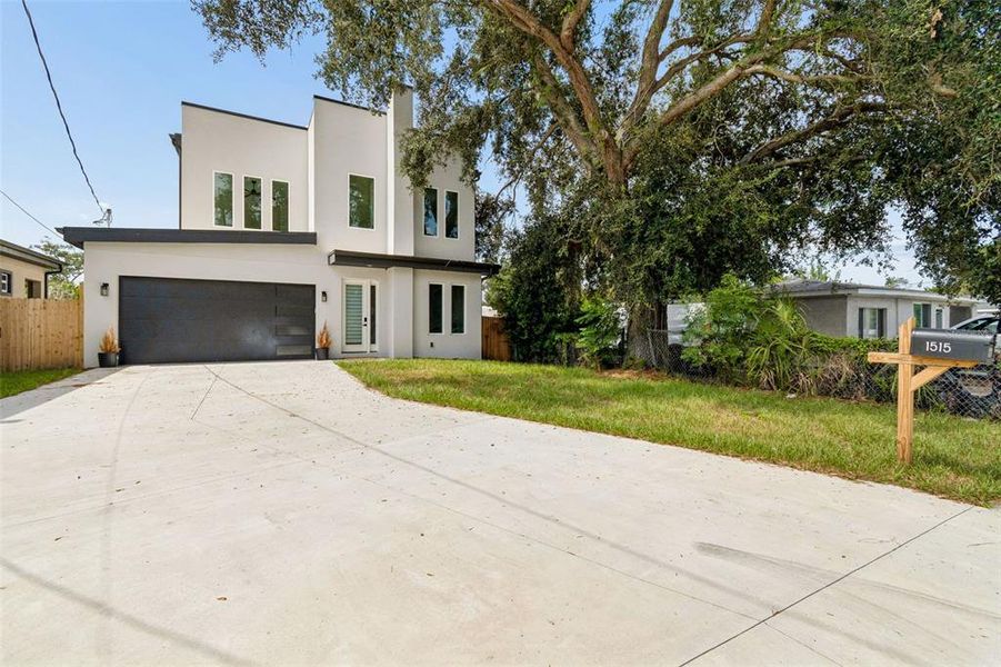 Front exterior of a new home in , Tampa, FL, highlighting curb appeal (Image 32).