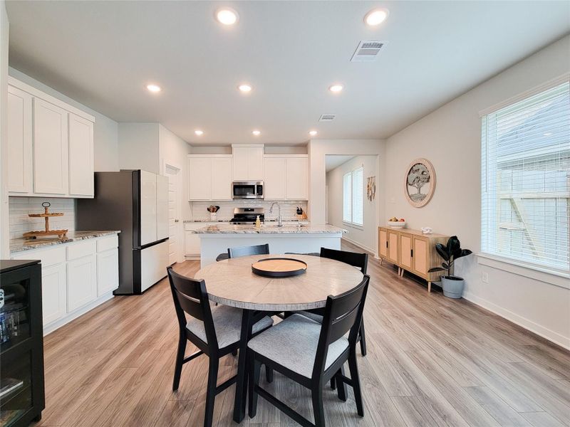 natural light in the dining area makes the space bright and welcoming