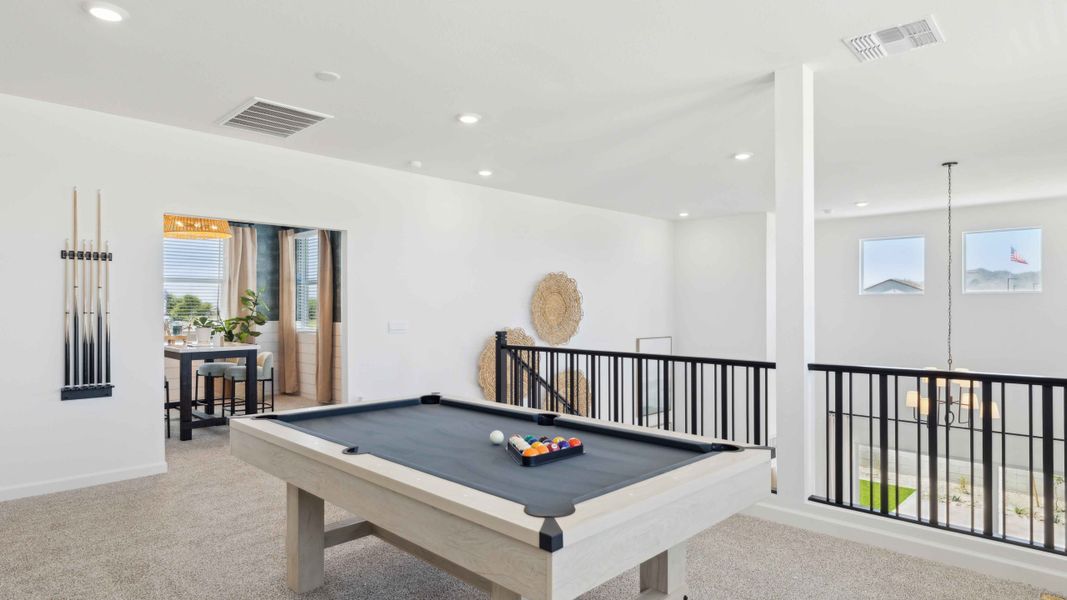 Representative furnished interior of a home built from the Stork by D.R. Horton in Apache Farms, Buckeye (Image 31).
