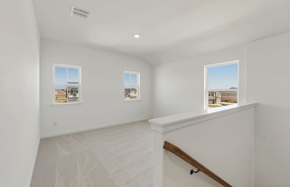 Representative unfurnished interior of a home built from the Lochridge by Pulte Homes in Woodside, Georgetown (Image 16).