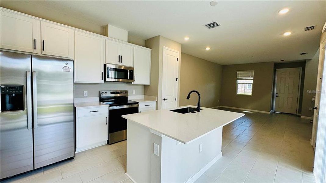 Furnished interior view inside a new home in , Kissimmee (Image 5). Furnished interior view inside a new home in , Kissimmee (Image 5).