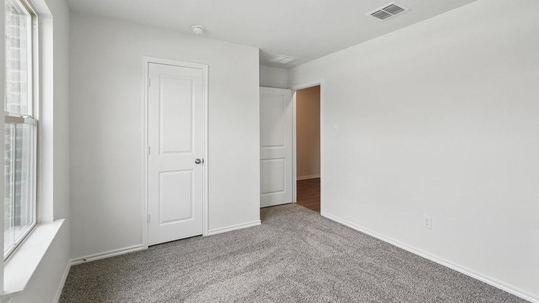 Spacious, unfurnished interior of a new home in Crane Crossing, Crandall (Image 20).