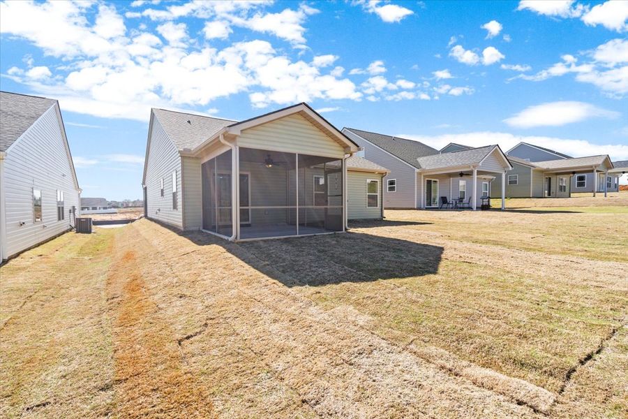 Representative exterior photo of a completed home built from the Wellford by Enchanted Homes in Hampshire Heights, Moore, SC (Image 24).