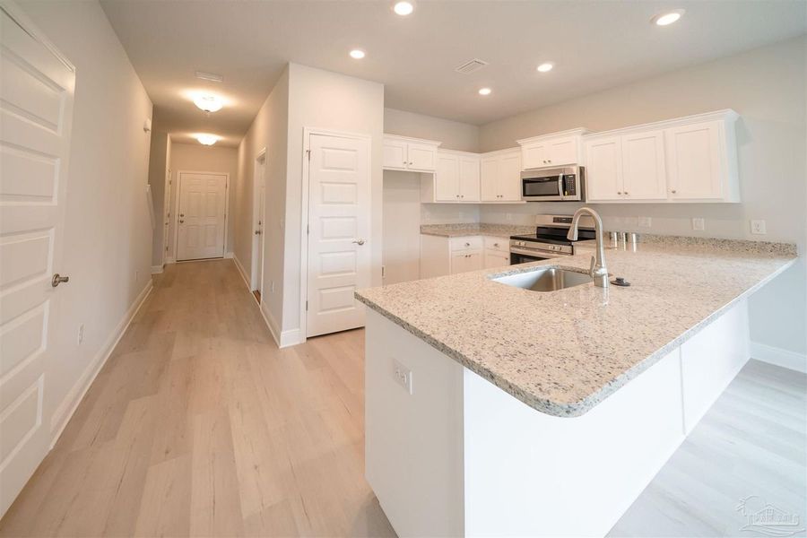 Furnished interior view inside a new home in Lexlee Estates, Pensacola (Image 4).