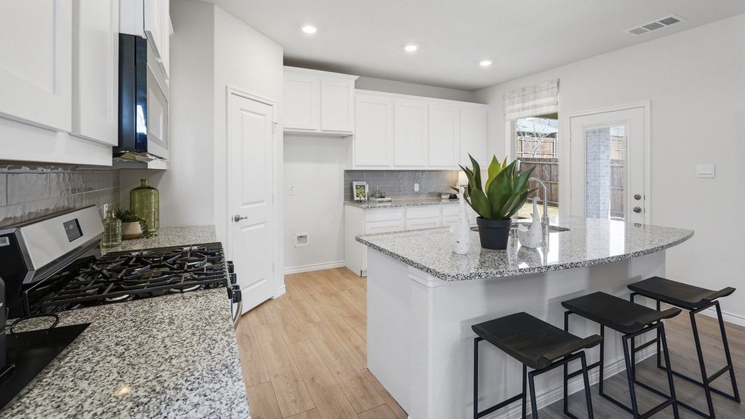 Representative furnished interior of a home built from the Lakehurst by D.R. Horton in The Woods at Lindsey Place, Anna (Image 14).