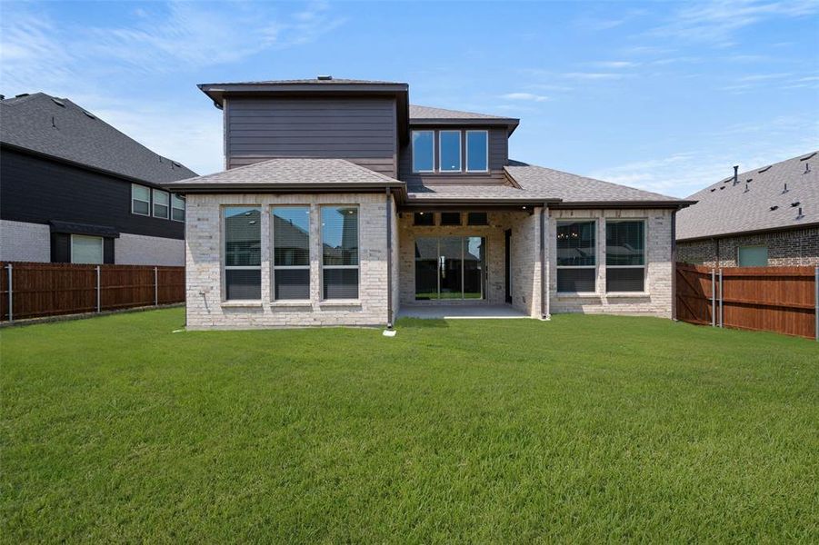 Exterior details and patio area of a home in Birdsong, Mansfield (Image 23). Exterior details and patio area of a home in Birdsong, Mansfield (Image 23).