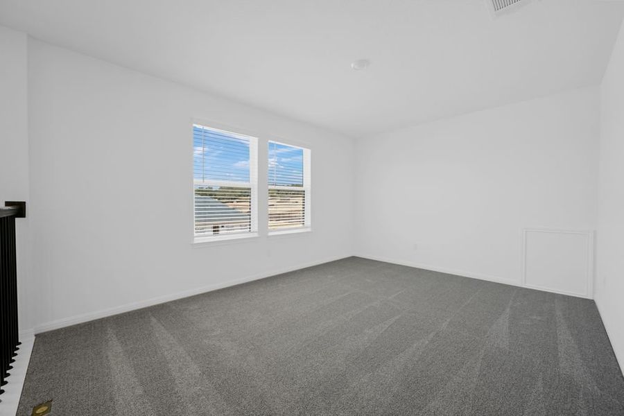 Spacious, unfurnished interior of a new home in Travisso Capri Collection, Leander (Image 10).