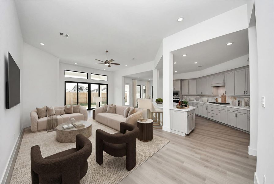 Walking into this expansive open-concept space, one immediately feels a sense of grandeur and tranquility thanks to the soaring ceilings and an abundance of natural light streaming through the massive glass slider. Walking into this expansive open-concept space, one immediately feels a sense of grandeur and tranquility thanks to the soaring ceilings and an abundance of natural light streaming through the massive glass slider.