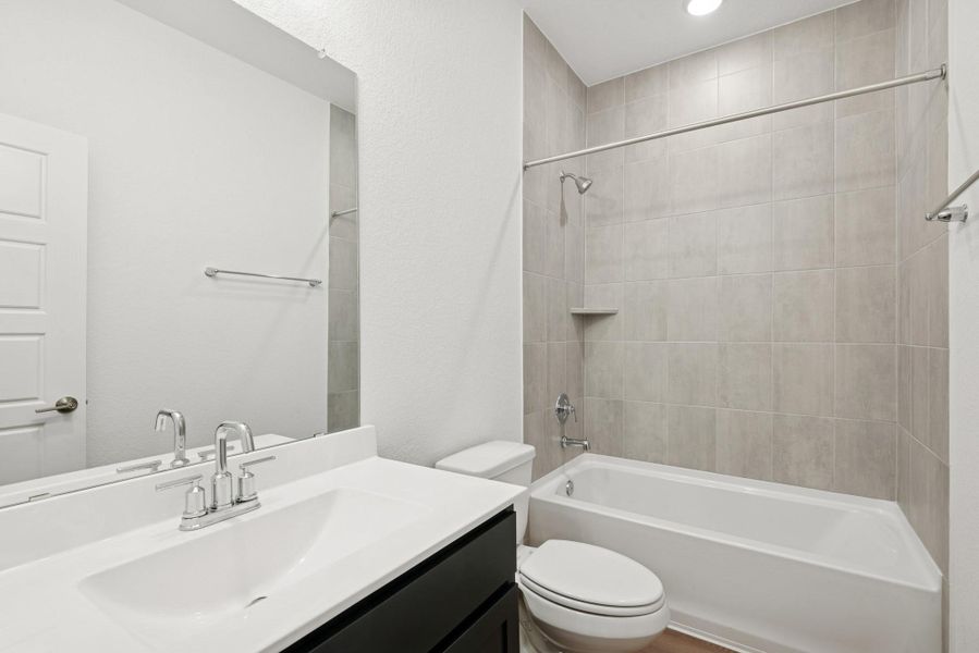 Furnished interior view inside a new home in Lone Star Landing, Montgomery (Image 17).