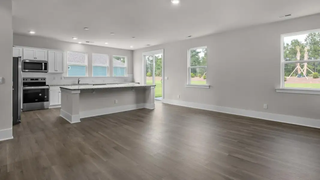 Representative unfurnished interior of a home built from the Forrester by D.R. Horton in The Highlands at Cedar Hill Landing, Navassa (Image 19).