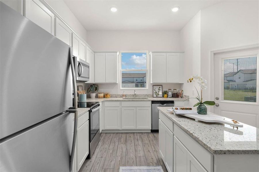 Furnished interior view inside a new home in Sol Vista, Dundee (Image 8).