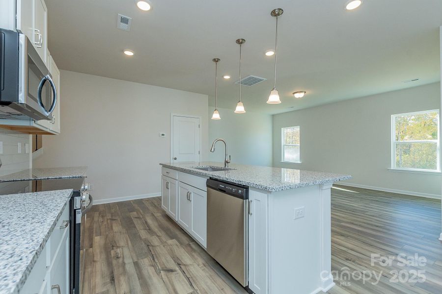 Furnished interior view inside a new home in Country Club Village, Salisbury (Image 6).