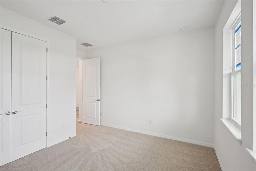 Spacious, unfurnished interior of a new home in Primrose at Longleaf, New Port Richey (Image 23).