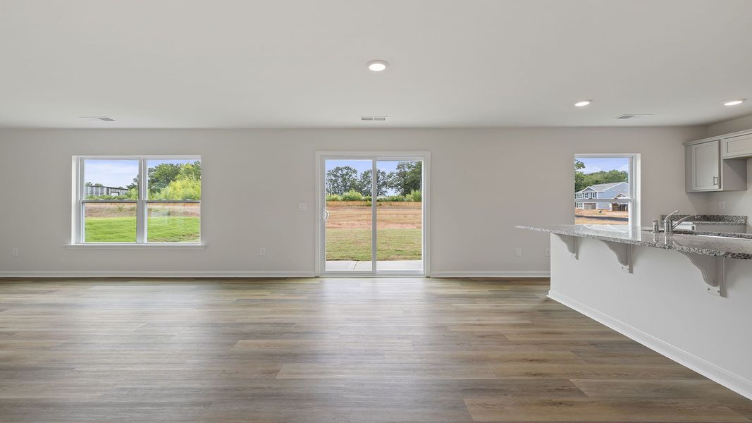 Spacious, unfurnished interior of a new home in Bentley Park, Greenwood (Image 17).