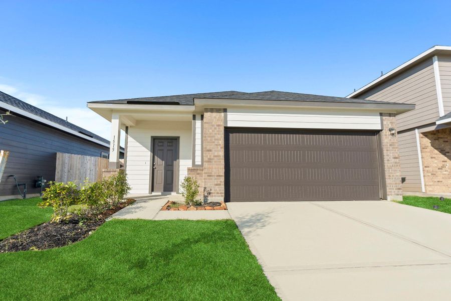 Another lovely view of the home’s front exterior highlighting the covered entryway and lush landscaping—perfect for relaxing with a morning coffee while greeting friendly neighbors! Located in Sweetgrass Village with parks, a clubhouse, pickleball courts, and a sparkling pool for year-round enjoyment! What a place to call home! No flooding during any of the storms! Move in ready Another lovely view of the home’s front exterior highlighting the covered entryway and lush landscaping—perfect for relaxing with a morning coffee while greeting friendly neighbors! Located in Sweetgrass Village with parks, a clubhouse, pickleball courts, and a sparkling pool for year-round enjoyment! What a place to call home! No flooding during any of the storms! Move in ready