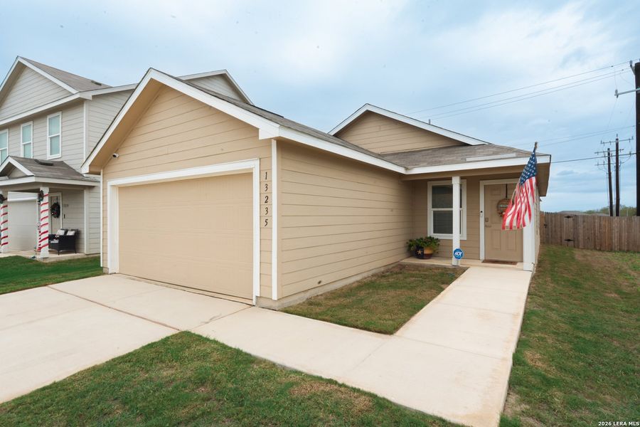Front exterior of a new home in Mission del Lago, San Antonio, TX, highlighting curb appeal (Image 2). Front exterior of a new home in Mission del Lago, San Antonio, TX, highlighting curb appeal (Image 2).