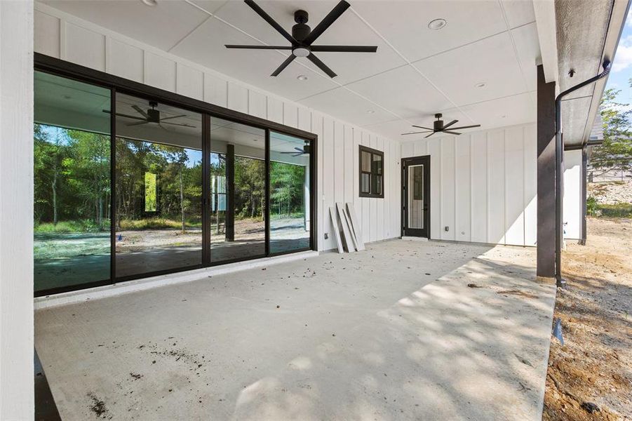 View of patio / terrace featuring a ceiling fan View of patio / terrace featuring a ceiling fan