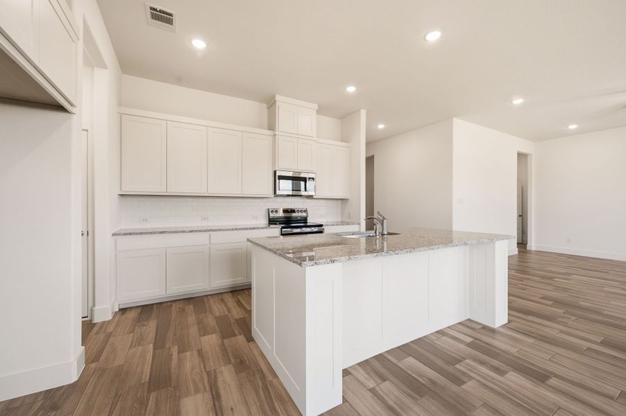Furnished interior view inside a new home in Saddleback Estates, Boyd (Image 7).