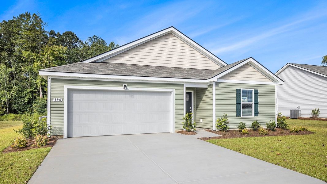Front exterior of a new home in Pinewood Estates, Conway, SC, highlighting curb appeal (Image 2).