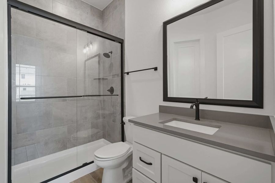 Representative furnished interior of a home built from the Malibu by Chesmar Homes in Fulshear Lakes, Fulshear (Image 6).