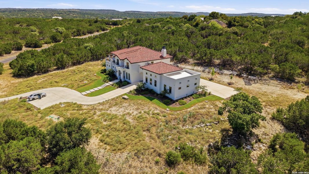 Front exterior of a new home in , Boerne, TX, highlighting curb appeal (Image 26).