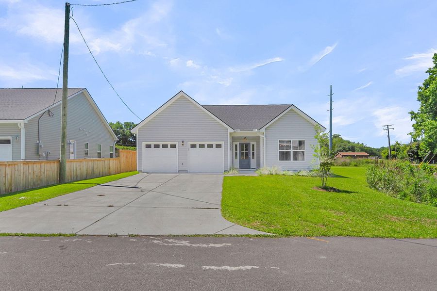 Front exterior of a new home in , North Charleston, SC, highlighting curb appeal (Image 21).