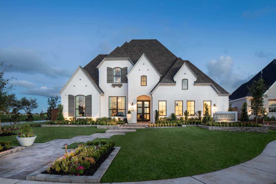 Front exterior of a new home in Meridiana: 65ft. lots, Manvel, TX, highlighting curb appeal (Image 1). Front exterior of a new home in Meridiana: 65ft. lots, Manvel, TX, highlighting curb appeal (Image 1).
