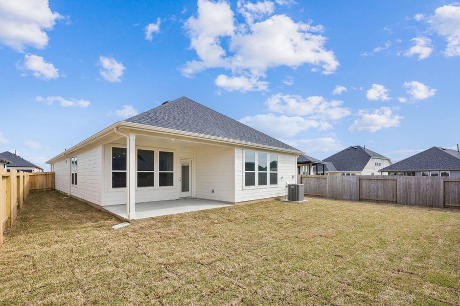 Exterior details and patio area of a home in Montgomery Bend, Montgomery (Image 3).