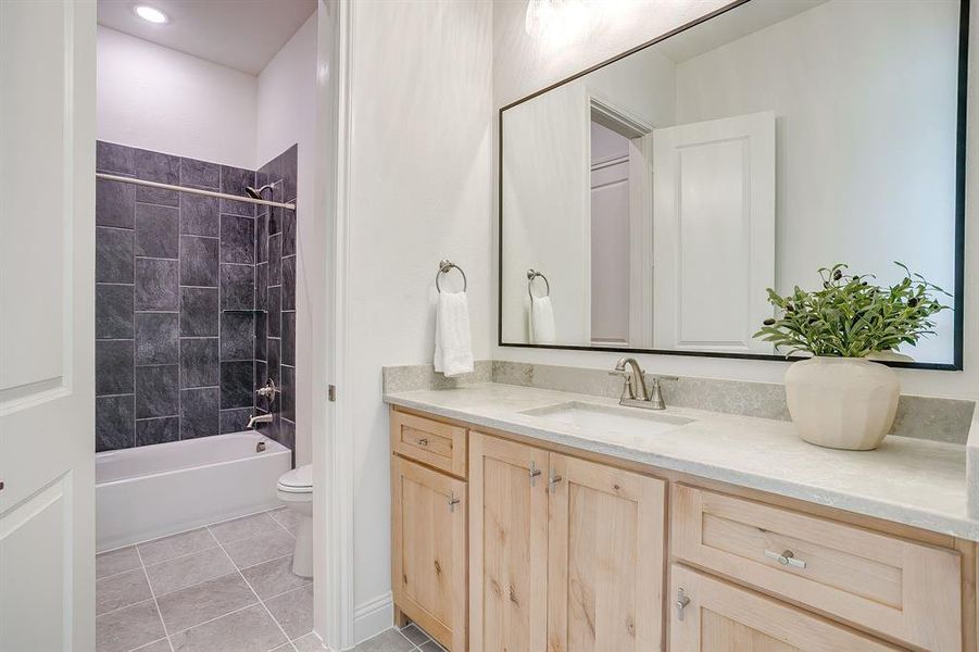 Full bath with custom cabinetry, soft close drawers and doors