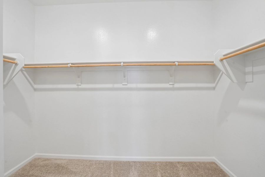 Primary walk in closet Primary walk in closet