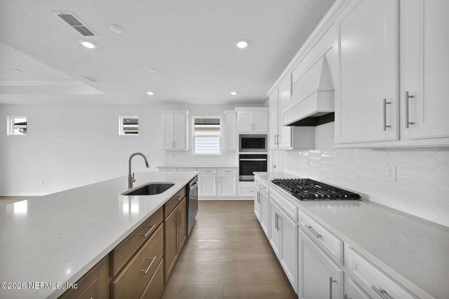 Furnished interior view inside a new home in Summer Bay at Grand Oaks, St. Augustine (Image 6).