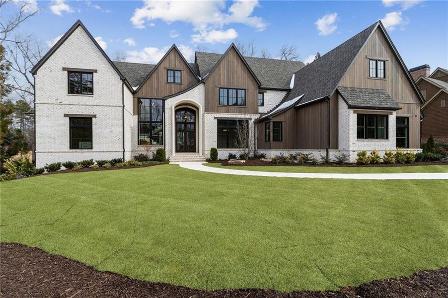Front exterior of a new home in , Suwanee, GA, highlighting curb appeal (Image 35).