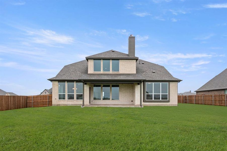 Exterior details and patio area of a home in Coyote Crossing, Godley (Image 19).
