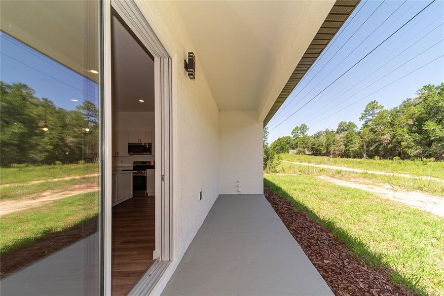 Exterior details and patio area of a home in , Citrus Springs (Image 27).